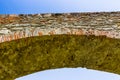detail of medieval humpback bridge in Italy
